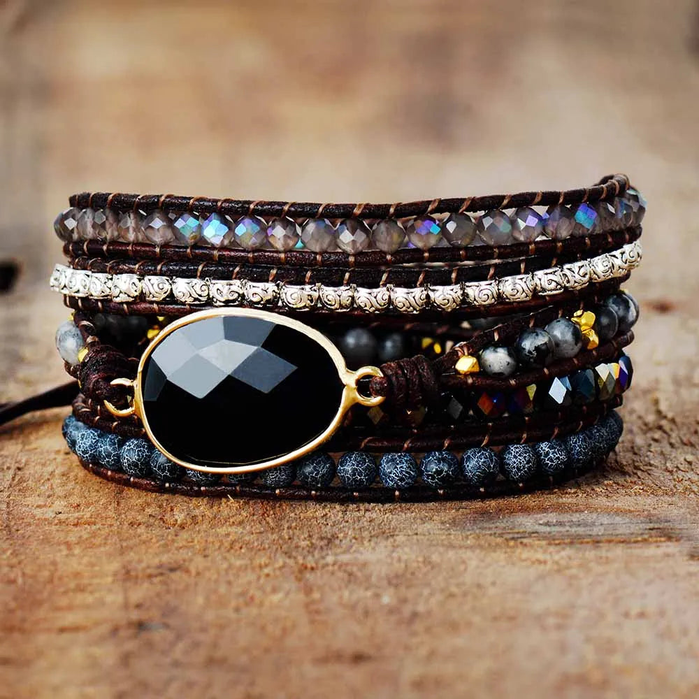A beautifully crafted Black Onyx Bracelet featuring a unique bohemian design with an easy-hook clasp, showcasing the deep black stone and intricate details.