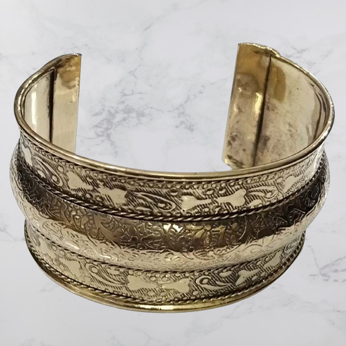 Bohotusk Chunky Adjustable Brass Bangle Bracelet showcasing its elegant design and adjustable feature.