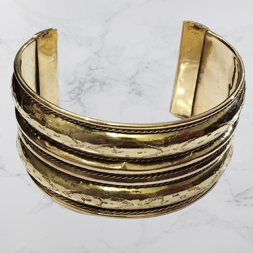 Bohotusk Roman Adjustable Brass Bangle Bracelet showcasing its elegant design and adjustable feature.