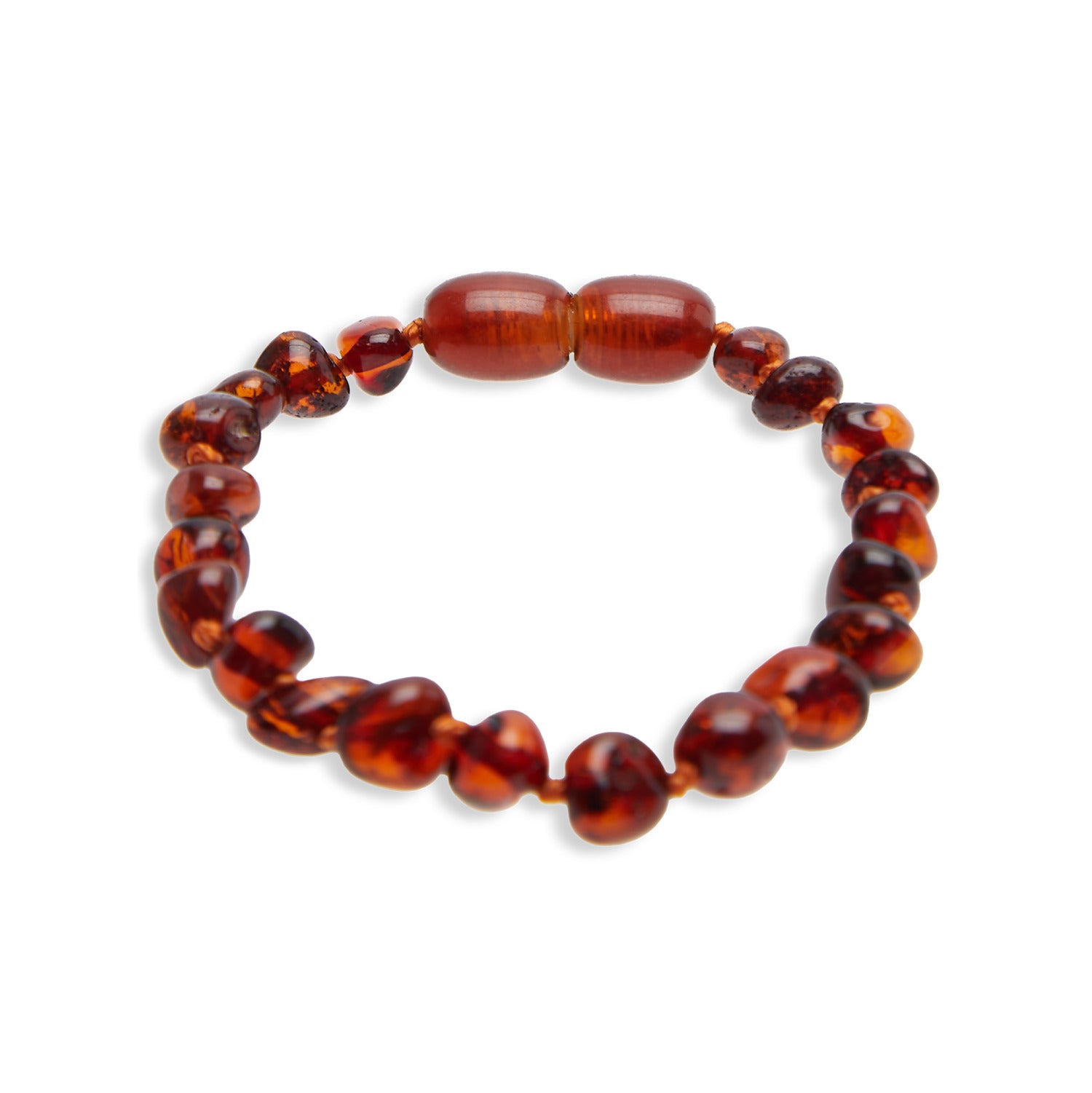 Bracelet en ambre couleur cognac pour bébé, fabriqué à partir d'ambre de la mer Baltique, avec des perles polies et un fermoir sécurisé.