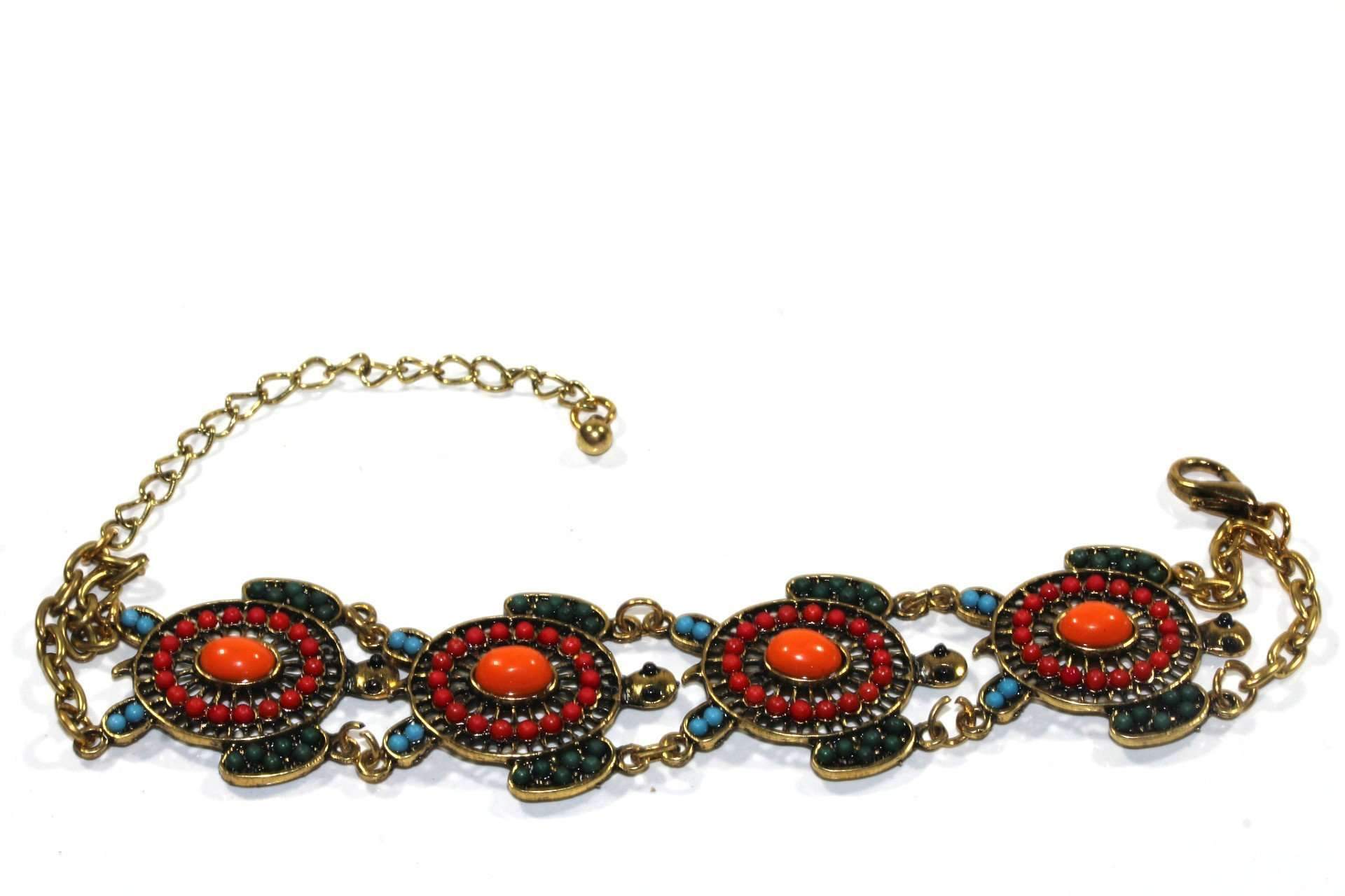 Colorful Bead Drop Turtle Bracelet featuring antique gold turtle charms and vibrant bead drops, showcasing a stylish design.