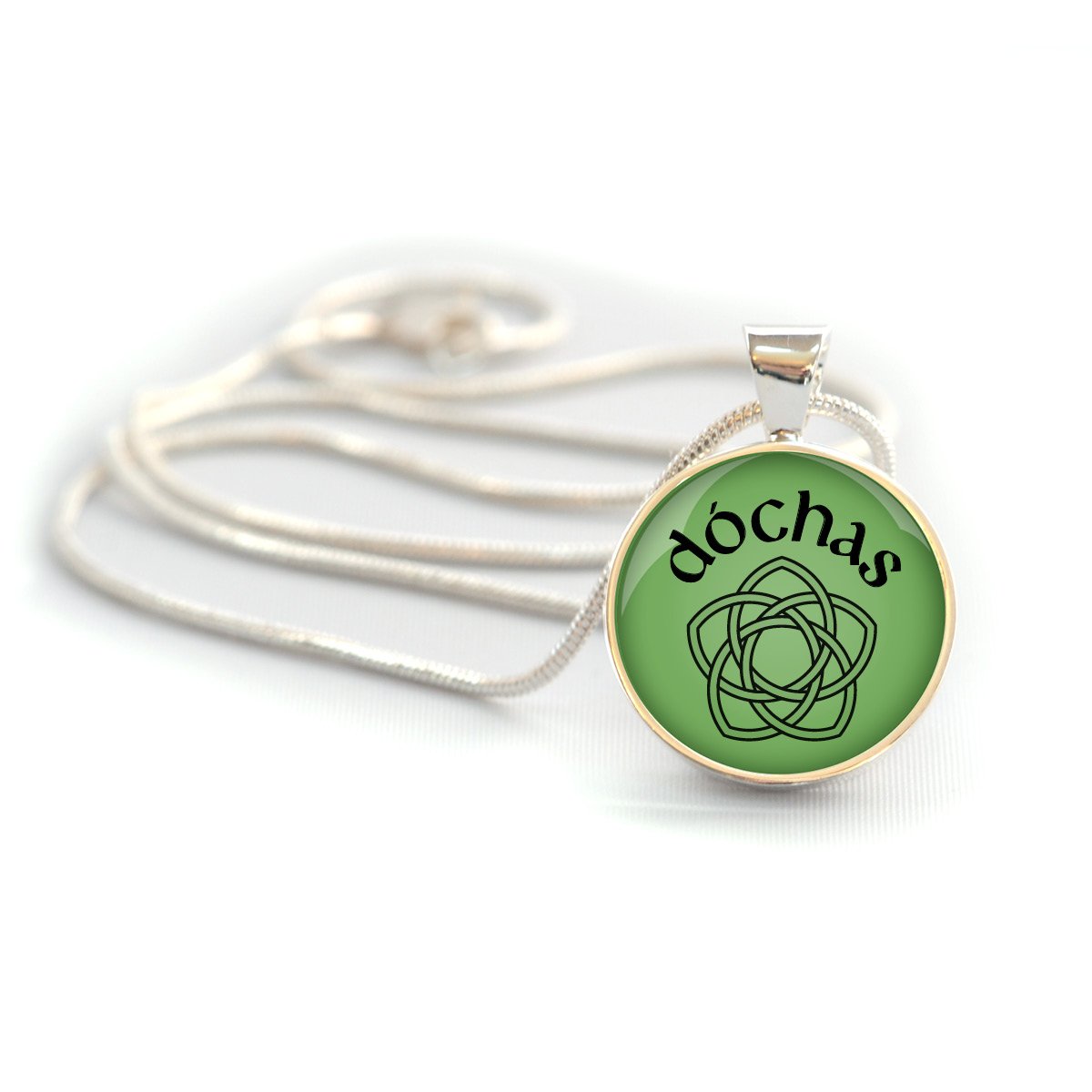 Dóchas Celtic Rose Silver-Plated Necklace and Bracelet set, featuring a glass charm with the word 'dóchas' and a Celtic rose design.