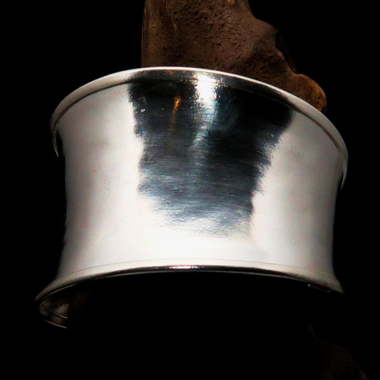 A beautifully handcrafted extra wide sterling silver bracelet, hallmarked 925, showcasing its elegant design and comfortable fit.