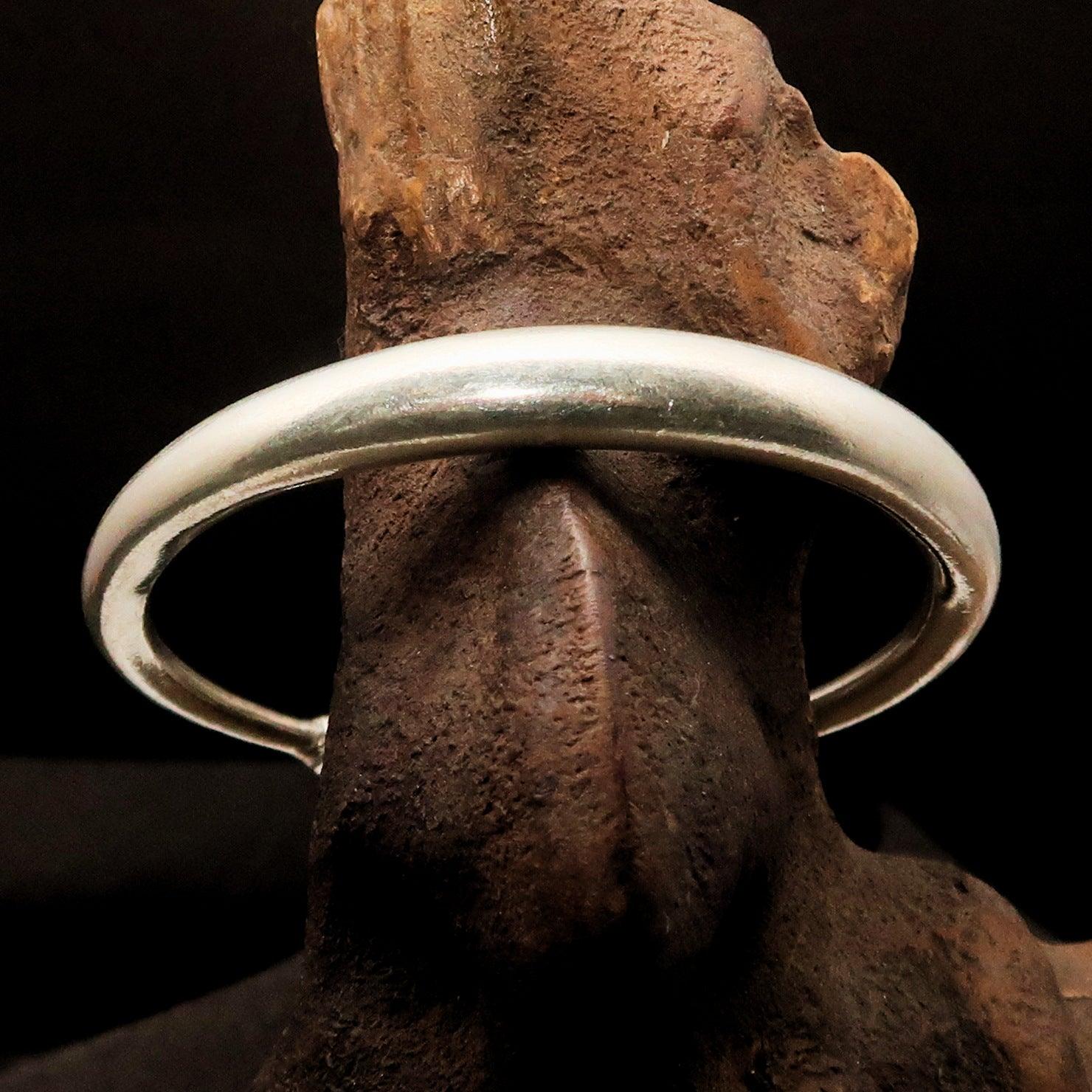 A beautifully handcrafted slim minimalistic Sterling Silver Bracelet, showcasing its elegant design and hallmark 925.