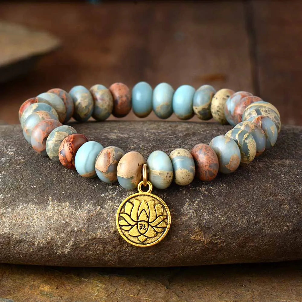 Handmade Imperial Jasper Lotus Bracelet featuring natural beads and a stylish Lotus charm, suitable for both men and women.