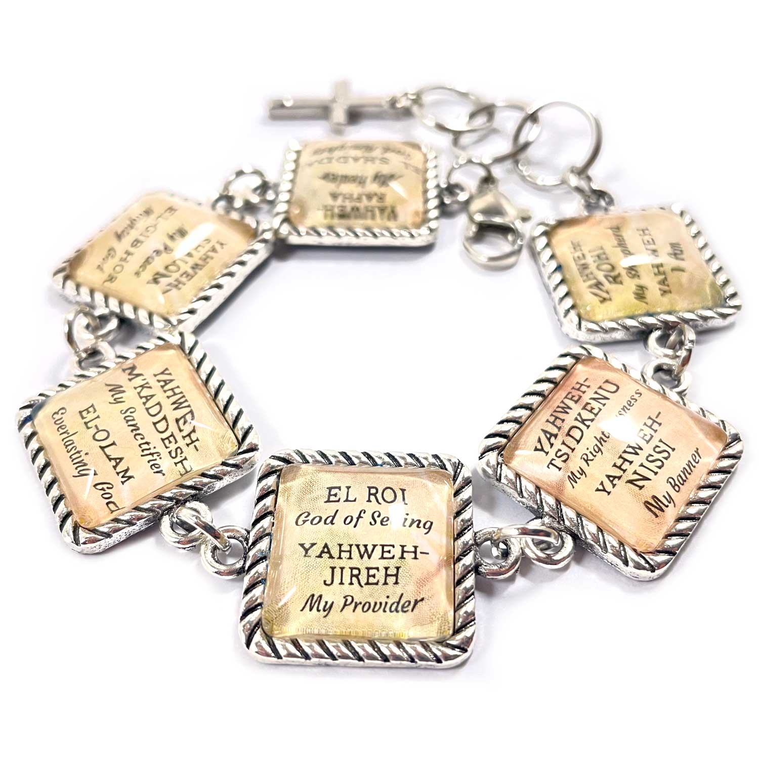 Jesus' I AM Statements Glass Scripture Charm Bracelet featuring six square glass charms with biblical names of God and a dangling cross charm.