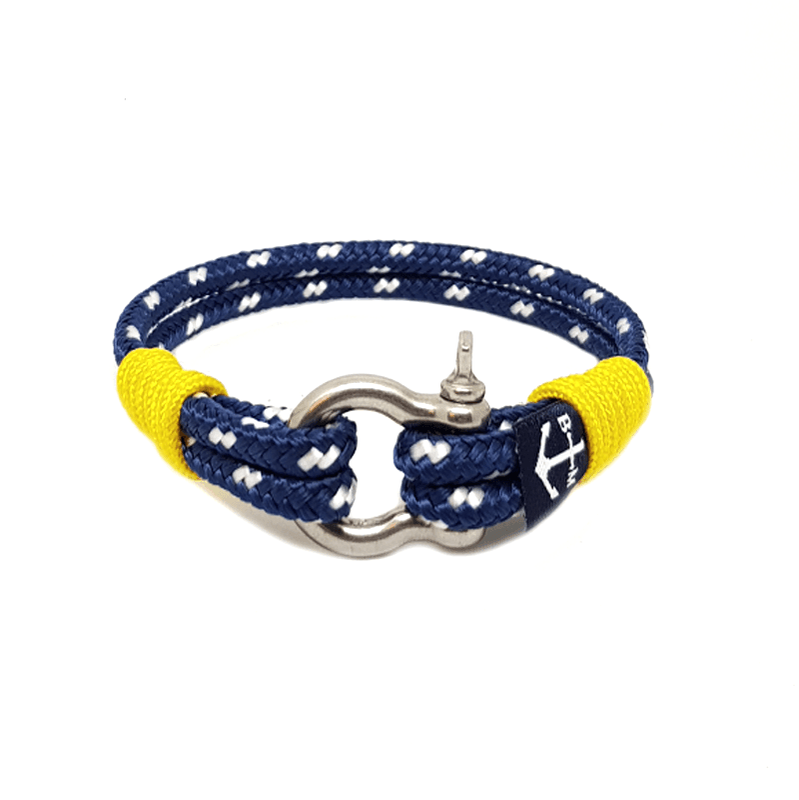 Julius Caesar Nautical Bracelet featuring blue and yellow nautical ropes with a stainless steel shackle, elegantly displayed.