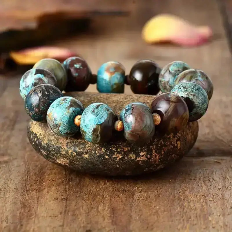 A beautiful Mala Beaded Bracelet made with natural healing stones, featuring a bohemian design and elastic band for comfortable wear.