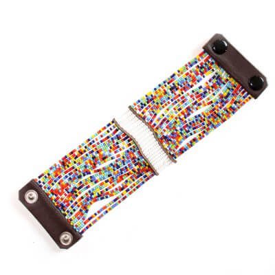 Colorful Maasai Beaded Cuff Bracelet showcasing intricate beadwork and flexible nylon threads, perfect for stylish arm adornment.
