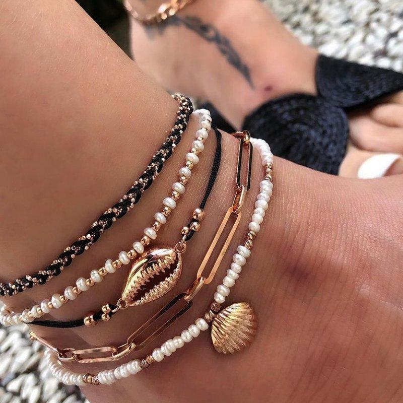 Multi Layered Gold Shell Pendant Chains Ankle Bracelet featuring delicate gold chains and shell pendants, perfect for summer fashion.