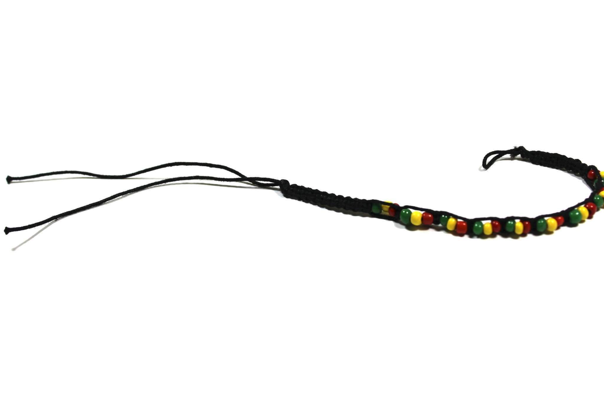 Handwoven Rasta Vibrations Bracelet with glossy red, yellow, and green beads on an adjustable cord.