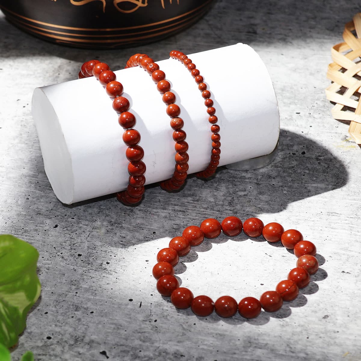 A beautiful Red Jasper Round Beads Bracelet showcasing natural red stones, handmade with elastic for a comfortable fit.