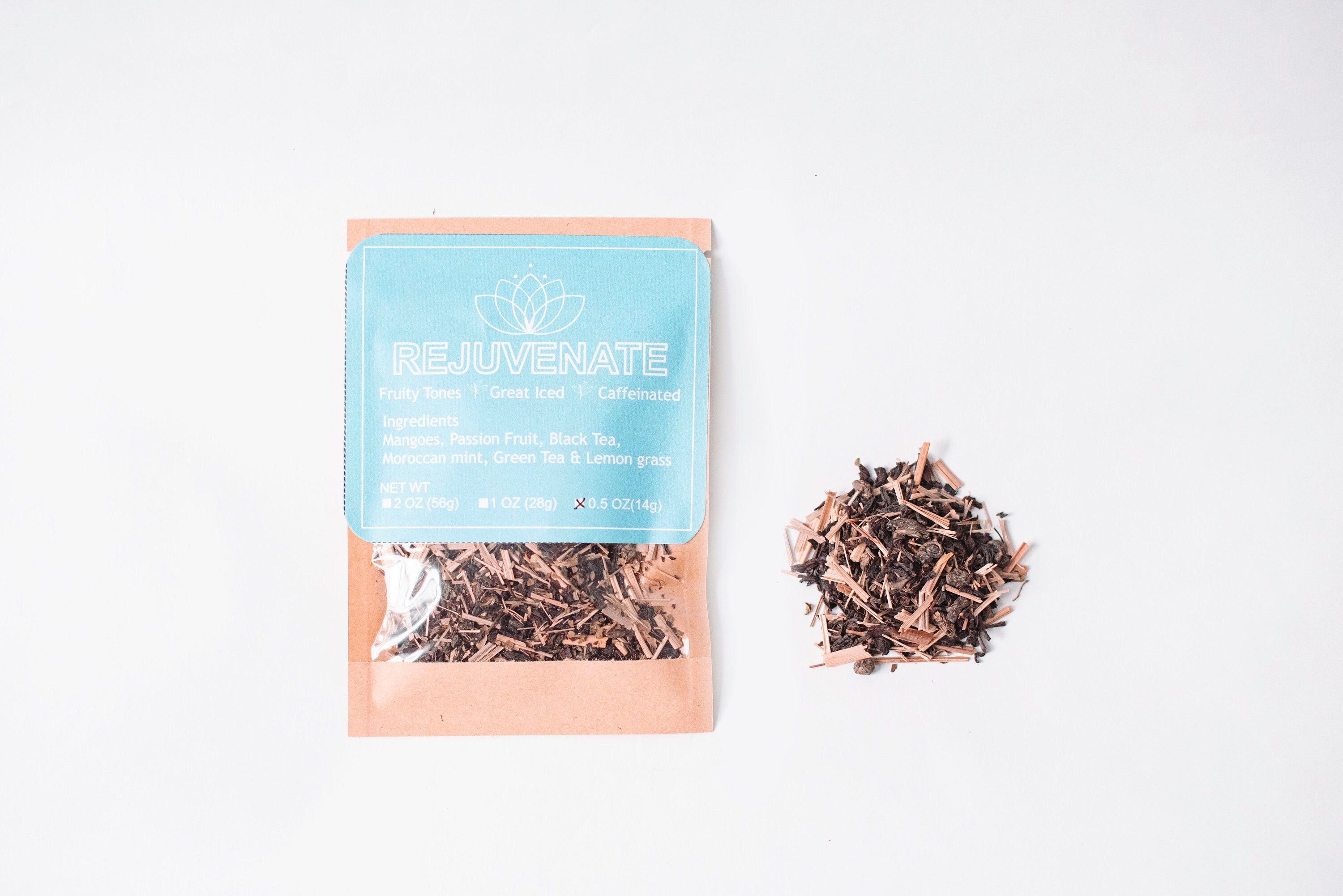 A vibrant package of Rejuvenate Herbal Tea featuring mangoes and passion fruits, showcasing its tropical flavor and herbal blend.