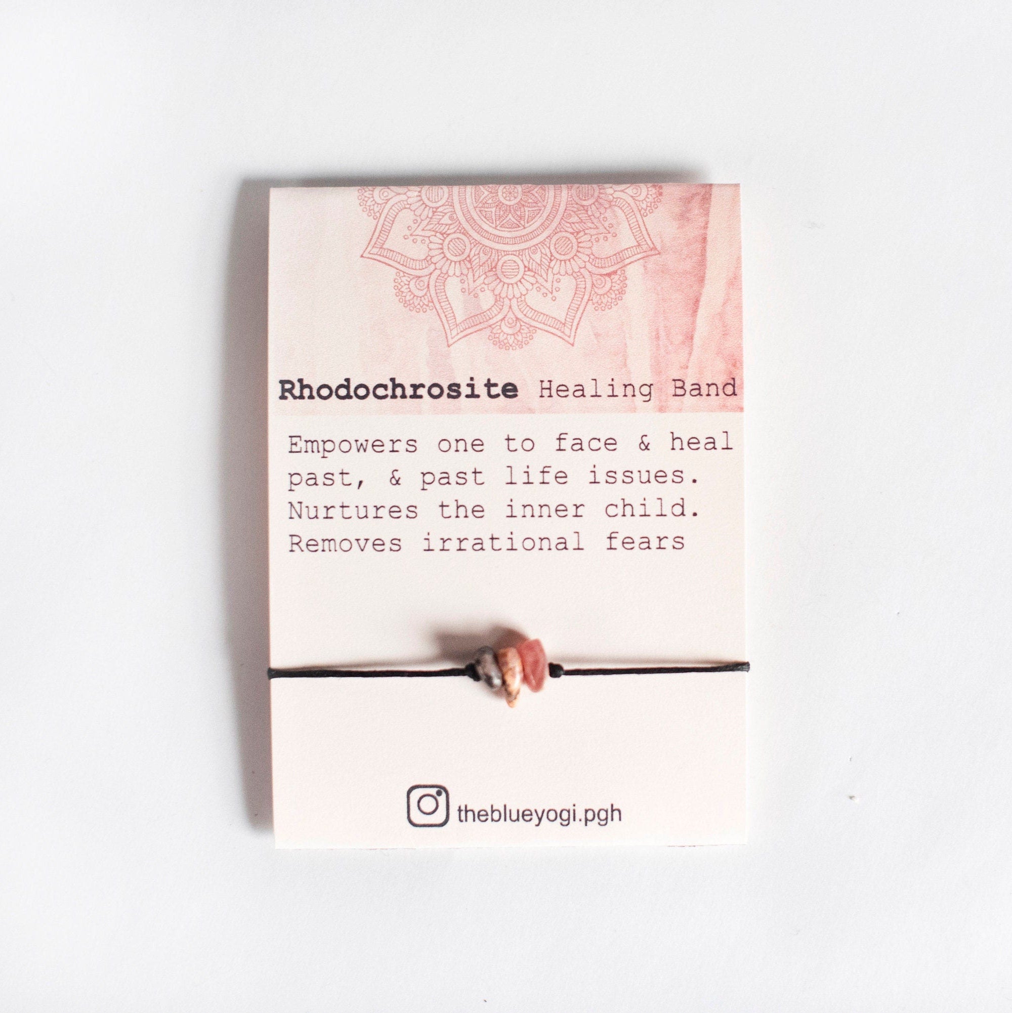 A handcrafted Rhodochrosite Gemstone Healing Band featuring natural gemstones and a tie closure, perfect for everyday wear.