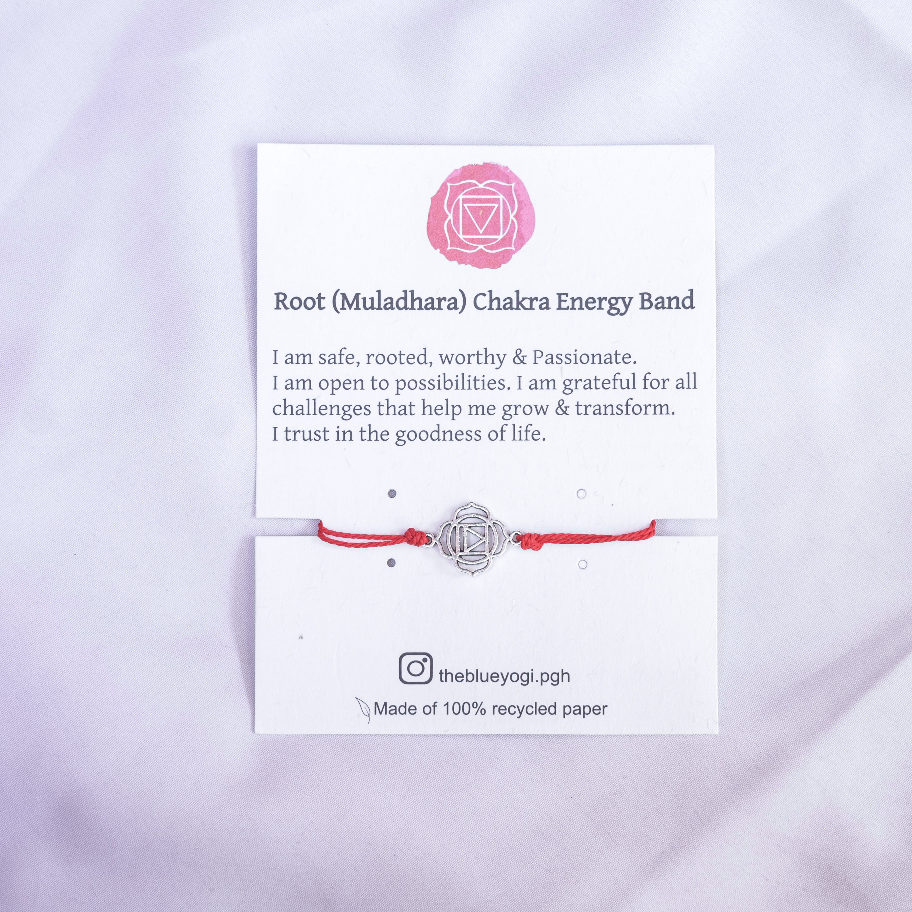 Root Chakra Energy Bracelet featuring a red design with a size adjustable sliding knot for a perfect fit.