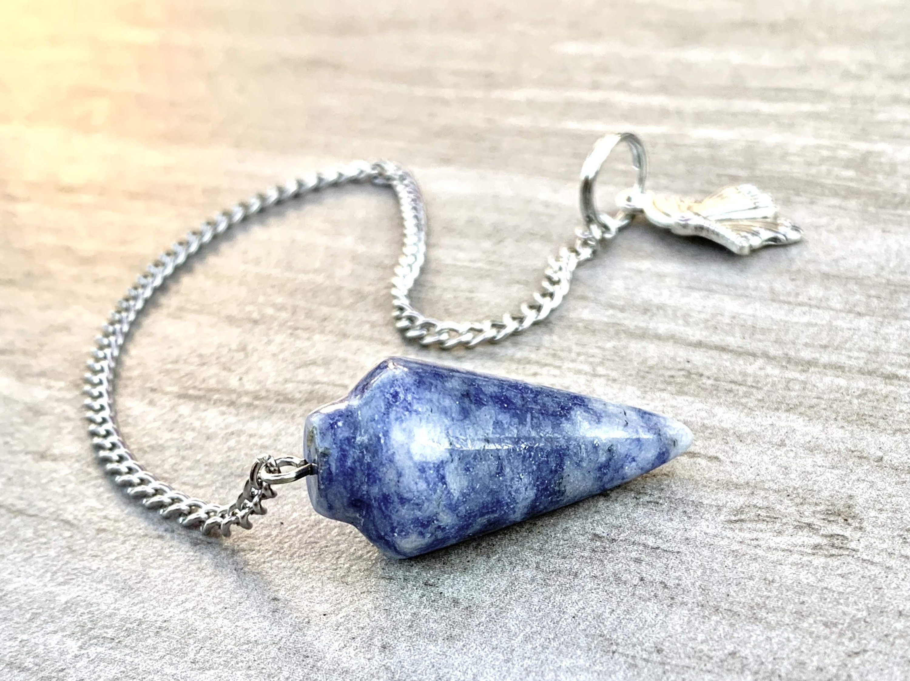 A beautiful Sodalite Pendulum/Bracelet showcasing deep blue hues, perfect for enhancing emotional balance and meditation.
