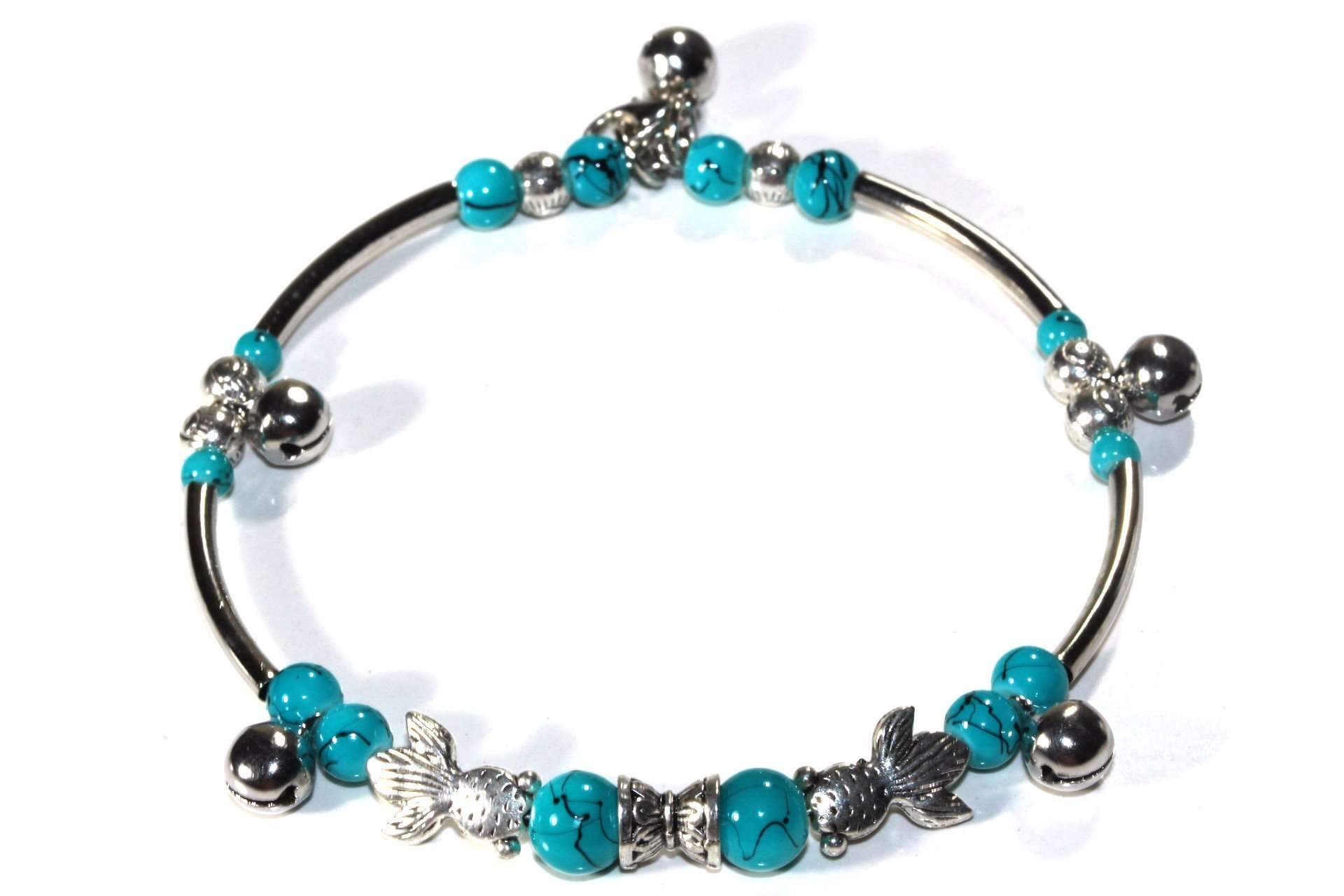 A charming bracelet featuring fish charms, turquoise and black marbled beads, and bells, adjustable for comfort.