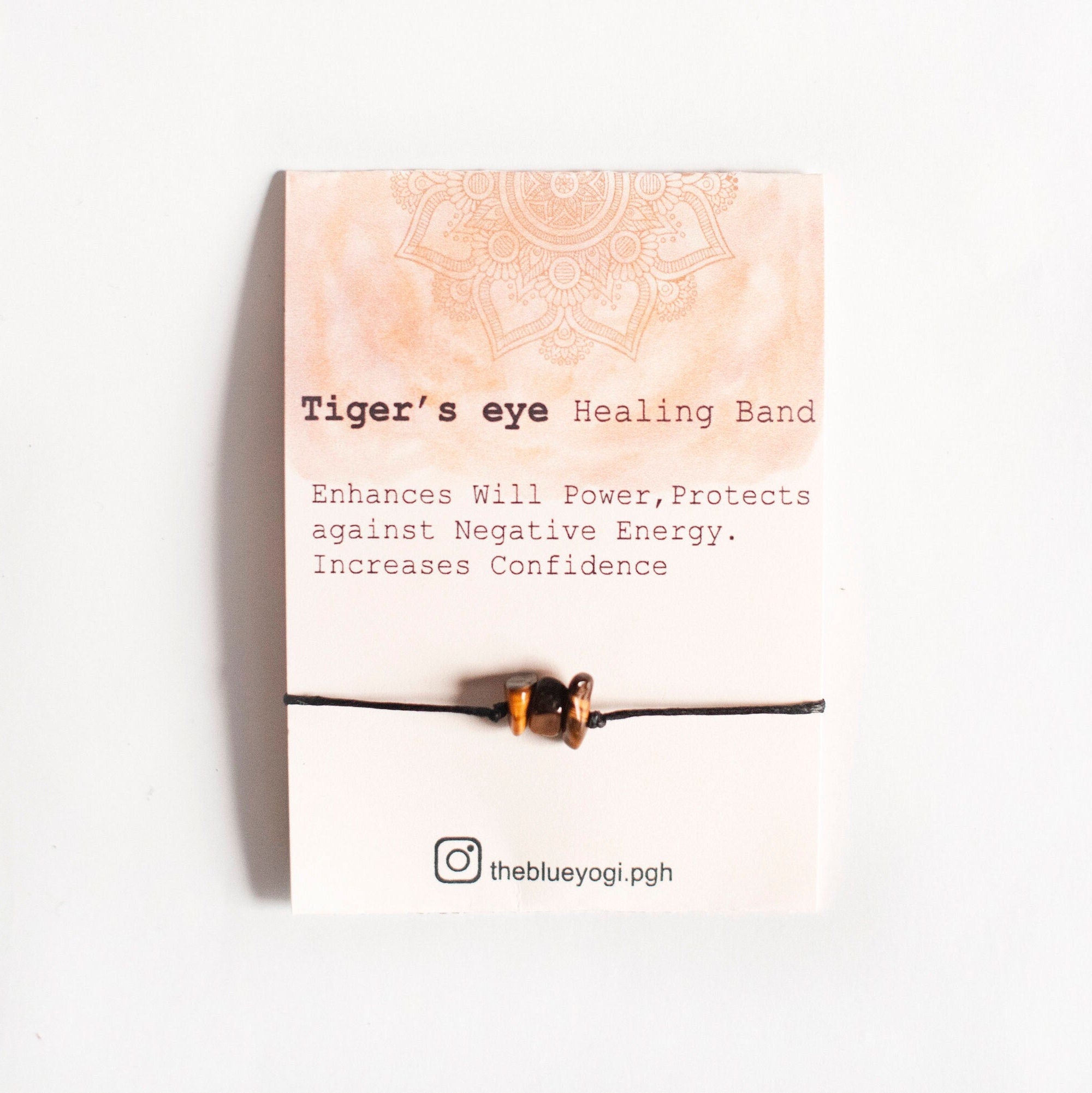 A handcrafted Tiger Eye Gemstone Power Band featuring natural gemstones with a tie closure, suitable for wearing as a bracelet or anklet.