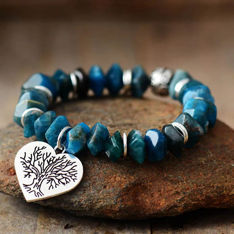 Tree of Life Apatite Stretch Bracelet featuring natural Apatite stones and a tree of life charm, showcasing a bohemian style.