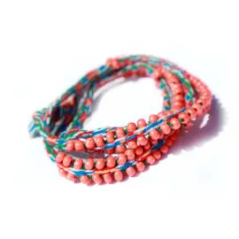 Washed Out Coral Beaded Tie Wraps featuring handwoven alpaca blend textile and Czech beads, styled as a bracelet, anklet, and choker.