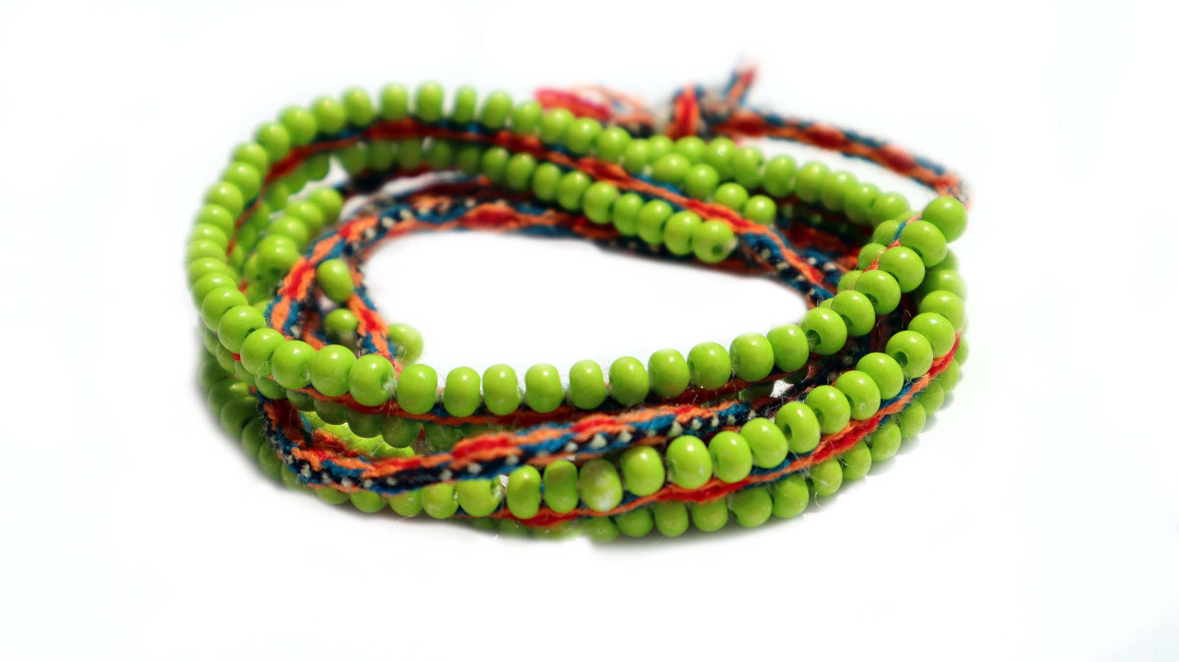 Washed Out Lime Beaded Tie Wraps featuring coral and teal colors, handwoven alpaca blend textile, and Czech beads, styled as a bracelet and necklace.