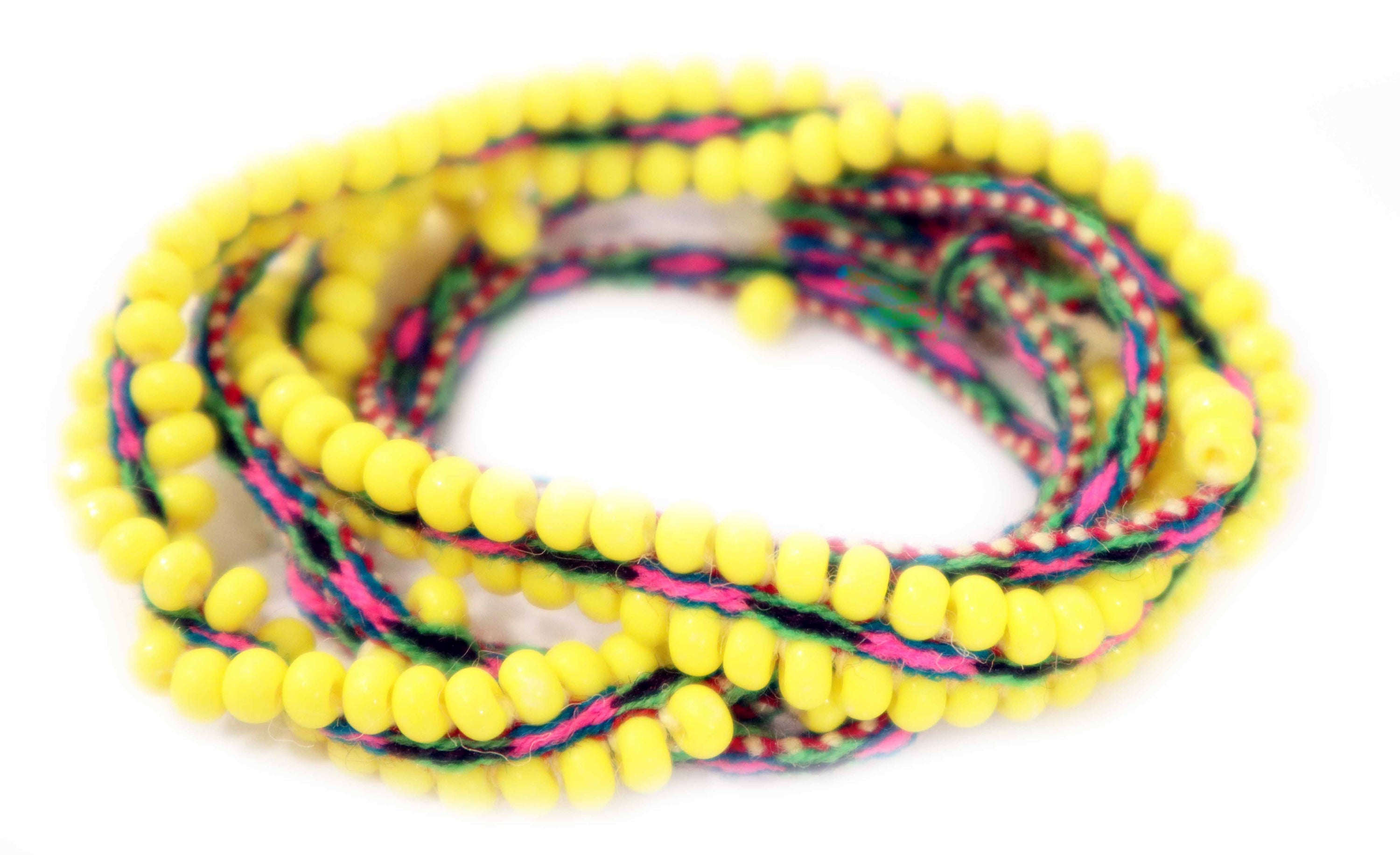 Washed Out Yellow Beaded Tie Wraps featuring vibrant fuchsia and teal colors, handwoven alpaca blend textile, and Czech beads.