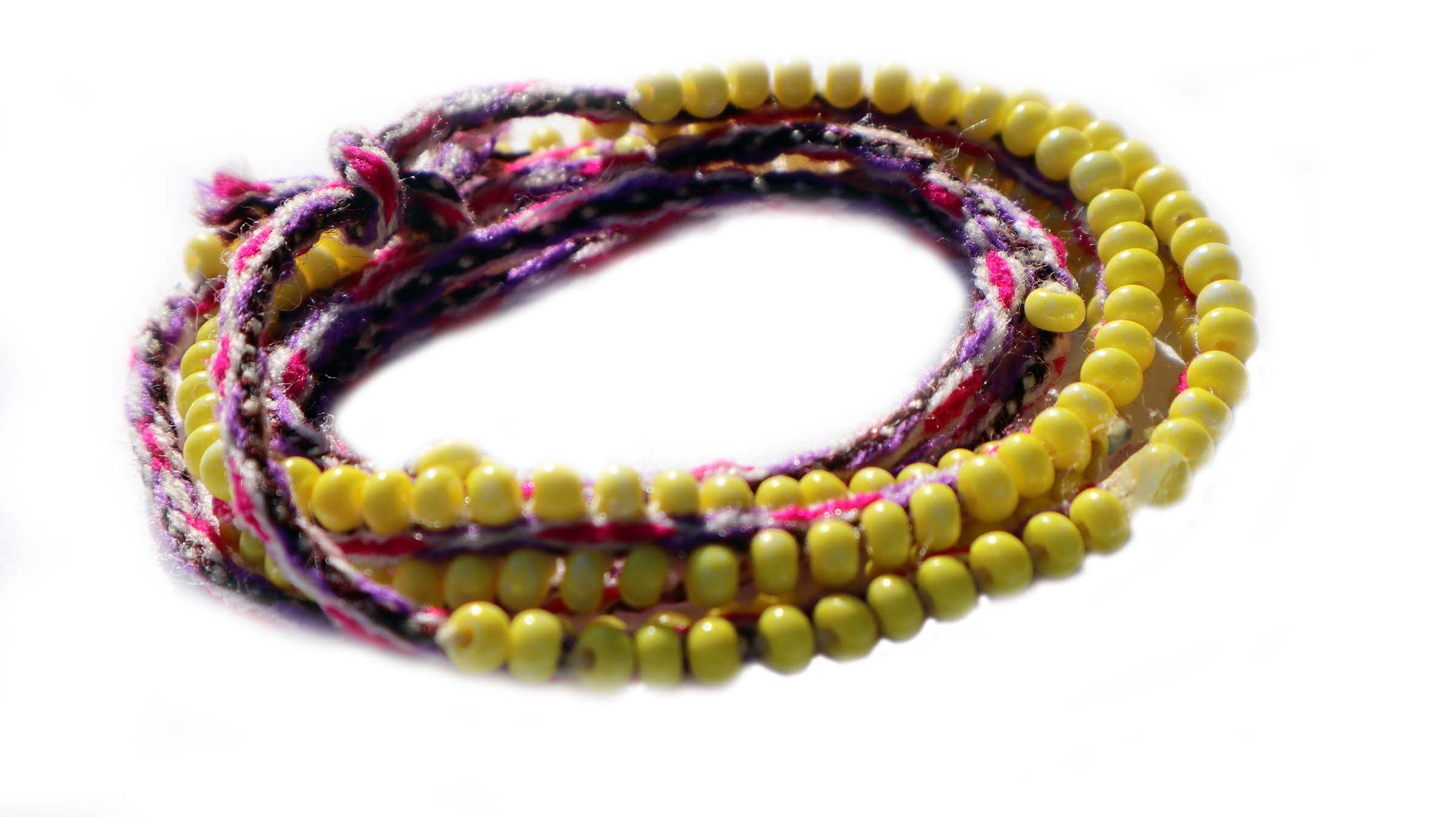 Washed Out Yellow Beaded Tie Wraps featuring iced purple and fuchsia colors, handwoven alpaca blend textile, and Czech beads.