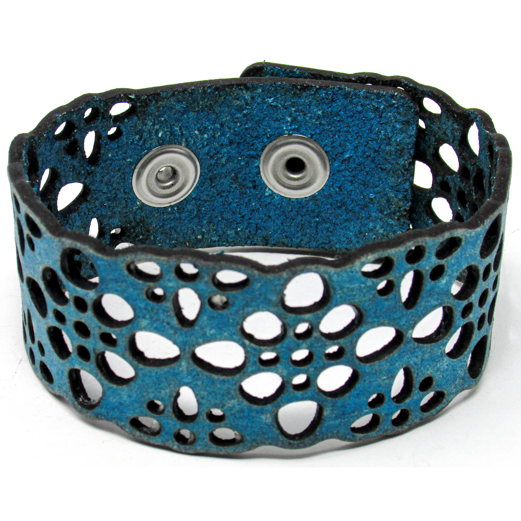 Women's Leather Bracelet featuring a Boho cut pattern, made of 100% cowhide leather with stainless steel snaps.