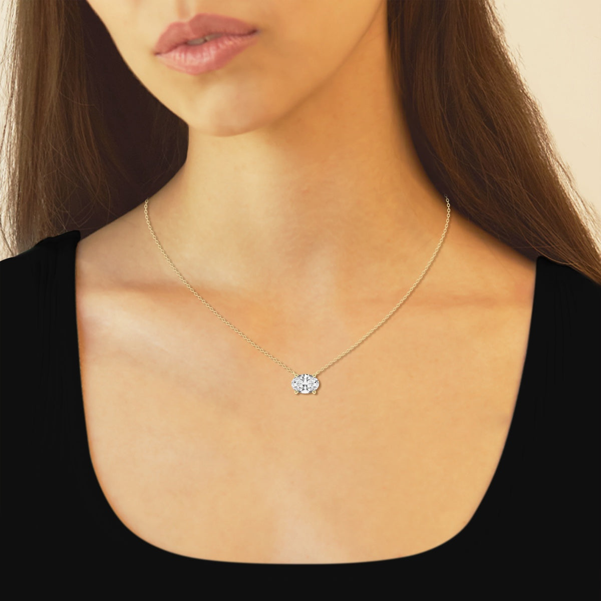 2.00 CTW AGI Certified Oval Lab Grown Diamond Solitaire Pendant on an 18-inch 14kt gold chain, showcasing its elegant design and brilliance.