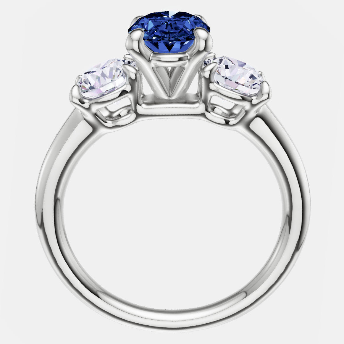A stunning 2.00 CTW lab created oval blue sapphire and diamond 3-stone engagement ring set in a 14kt solid gold band, elegantly displayed in a gift box.