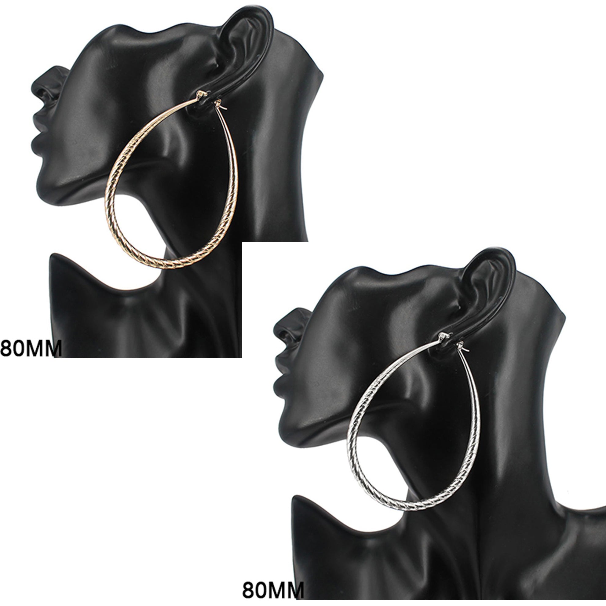 A pair of 80 MM hoop earrings featuring an etched teardrop design, showcasing elegance and style.