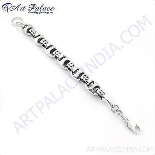 A pair of elegant 925 silver earrings featuring a checker cut pear lapis gemstone, showcasing a rich blue color and intricate design.