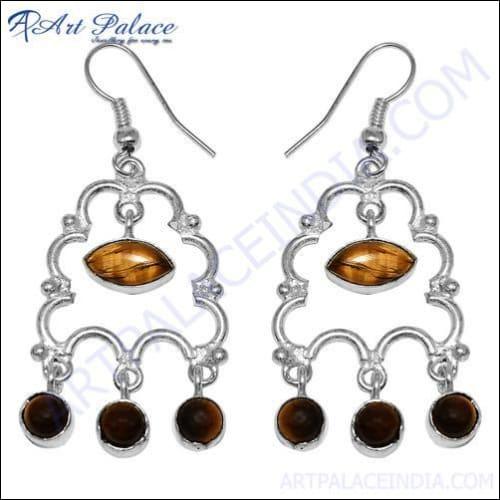 A pair of elegant 925 silver earrings featuring checker cut pear lapis gemstones, showcasing their unique design and craftsmanship.