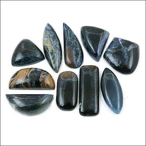 A pair of elegant 925 silver earrings featuring checker cut pear lapis gemstones, showcasing their unique design and rich blue color.