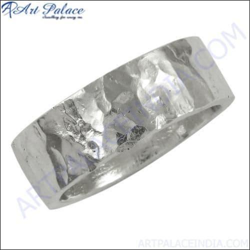 A pair of elegant 925 silver earrings featuring checker cut pear lapis gemstone, showcasing a rich blue color with golden flecks.