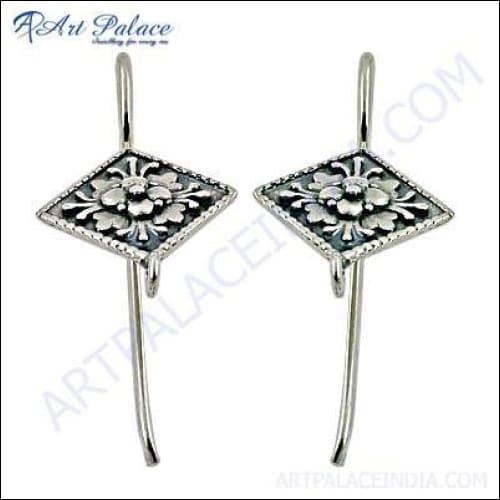 Elegant 925 silver earrings featuring a checker cut pear lapis gemstone, showcasing intricate design and craftsmanship.