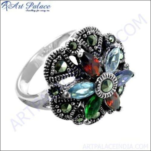 Elegant 925 silver earrings featuring a checker cut pear lapis gemstone, showcasing intricate craftsmanship and a stunning blue hue.