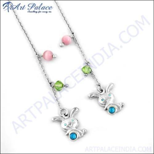 A pair of 925 silver earrings featuring vibrant green glass inlay and pink gemstones, showcasing artistic design and elegance.