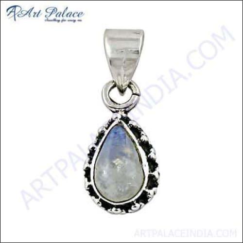 A stunning 925 silver ethnic pendant featuring a pear-shaped genuine Rainbow Moonstone, showcasing intricate silver craftsmanship.