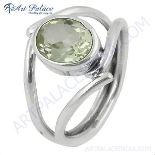 A stunning 925 silver ring featuring a vibrant green amethyst stone, showcasing intricate craftsmanship and elegant design.