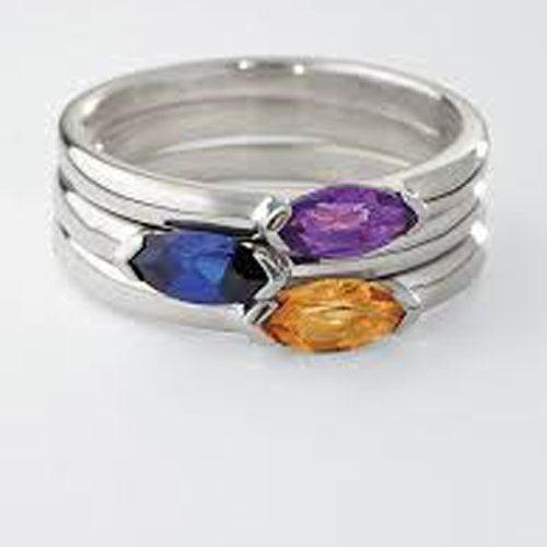 A stunning 925 silver finger ring featuring three multi-colored gemstones, showcasing elegance and craftsmanship.