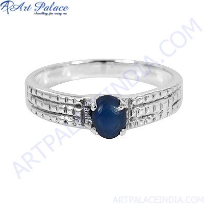 A beautiful 925 sterling silver adjustable ring featuring a vibrant blue sapphire gemstone, showcasing elegance and craftsmanship.