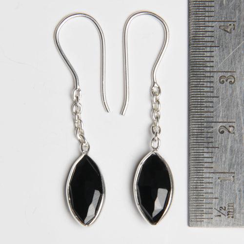 Elegant 925 sterling silver dangle earrings featuring black onyx marquise gemstones, showcasing a stylish and sophisticated design.