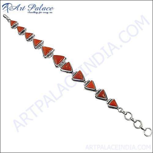 A beautiful 925 Sterling Silver bracelet featuring vibrant cherry red coral gemstones, showcasing exquisite craftsmanship and elegant design.