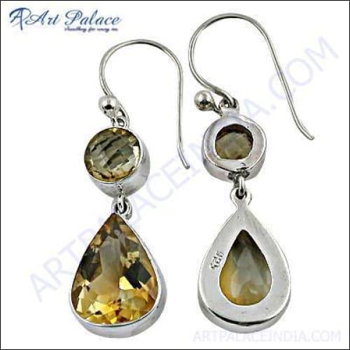 Elegant 925 sterling silver earrings featuring double citrine gemstones, showcasing a simple yet stylish design.