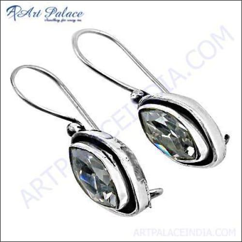 A pair of elegant 925 sterling silver earrings featuring sparkling cubic zirconia gemstones in a unique cut shape.
