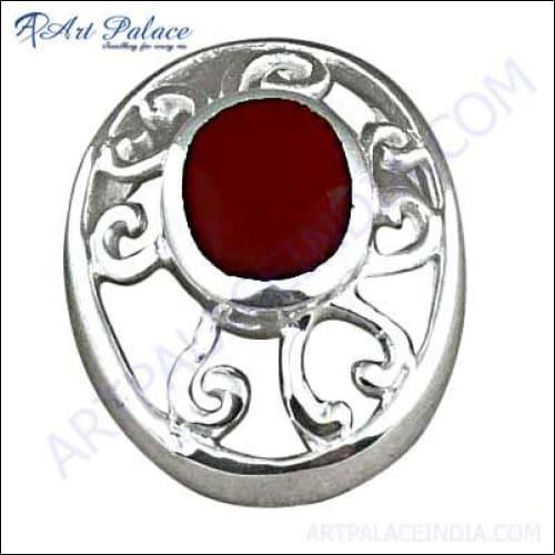 A beautifully crafted 925 sterling silver pendant featuring intricate Indian designs and a vibrant synthetic gemstone, showcasing elegance and artistry.