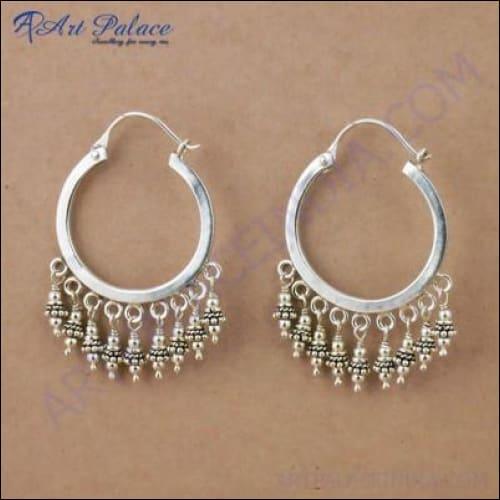 A pair of 925 sterling silver Indian designer Bali earrings with intricate patterns and a polished finish, showcasing traditional craftsmanship.