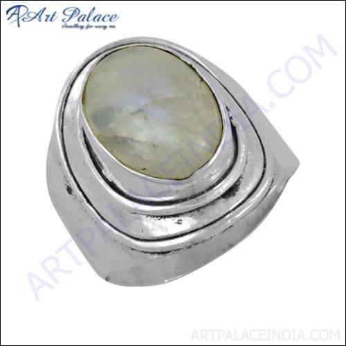 A stunning 925 sterling silver ring featuring a captivating rainbow moonstone gemstone, showcasing its elegant design and craftsmanship.