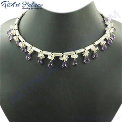 Amethyst Beaded Necklace featuring deep purple gemstones and intricate silver piping, showcasing elegance and craftsmanship.